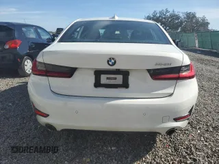 2019 BMW 3 Series 330i with VIN 3MW5R1J56K8B01545, listed as a Copart auction lot 82815374 with 52,655 mi miles and Salvage Title. Bid and sale history available at carsss.com. Image 6.
