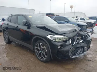 2020 BMW X2 xDrive28i with VIN WBXYJ1C09L5R16011, listed as a IAAI auction lot 41375127 with 46,498 mi miles. Bid and sale history available at carsss.com. Image 1.