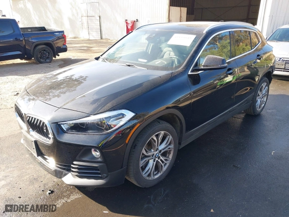 2019 BMW X2 xDrive28i with VIN WBXYJ5C52K5N24828, listed as a IAAI auction lot 41155049 with 59,597 mi miles. Bid and sale history available at carsss.com. Image 2.
