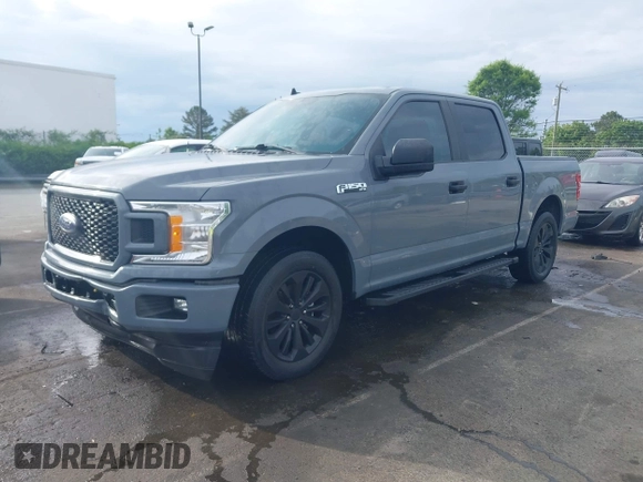 2020 Ford F-150 XL with VIN 1FTEW1CPXLKD05369, listed as a IAAI auction lot 42082934 with 64,954 mi miles and . Bid and sale history available at DreamBid. Image 2.
