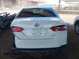 2024 Toyota Camry LE z VIN 4T1C11AK4RU864390, wystawiony jako IAAI lot #42212311 z przebiegiem 17 107 mil mil oraz . Historia ofert i sprzedaży dostępna na DreamBid. Obrazek 16.