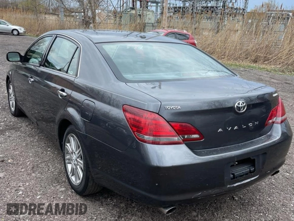 2010 Toyota Avalon XL with VIN 4T1BK3DB5AU353288, listed as a Copart auction lot 56857935 with 233,775 mi miles and Clean Title. Bid and sale history available at DreamBid. Image 3.
