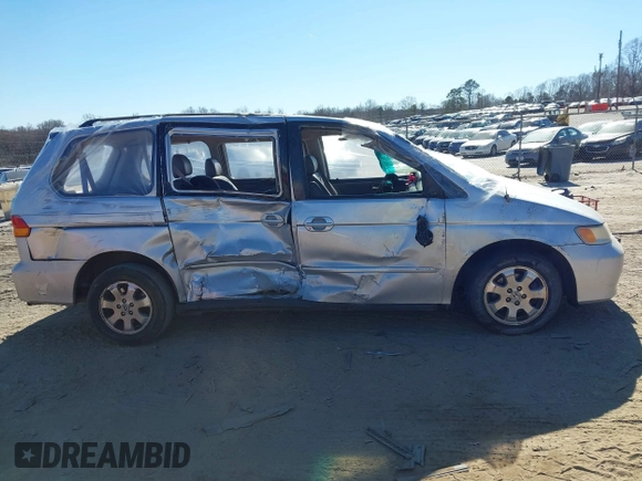 2004 Honda Odyssey EX-L with VIN 5FNRL18924B107971, listed as a IAAI auction lot 41699067 with Not Provided miles and . Bid and sale history available at DreamBid. Image 12.