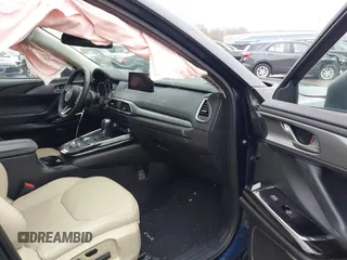 2021 Mazda CX-9 Touring z VIN JM3TCBCY4M0520362, wystawiony jako IAAI lot #41193396 z przebiegiem 17 323 mil mil oraz . Historia ofert i sprzedaży dostępna na DreamBid. Obrazek 5.