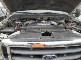 2004 Ford F-250 XL z VIN 1FTNX20P34EB05974, wystawiony jako Copart lot #86281324 z przebiegiem 184 896 mil mil oraz Czysty tytuł • Clean title. Historia ofert i sprzedaży dostępna na DreamBid. Obrazek 11.