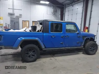 2021 Jeep Gladiator Willys with VIN 1C6HJTAG9ML535479, listed as a IAAI auction lot 41212241 with 81,044 mi miles and . Bid and sale history available at DreamBid. Image 14.