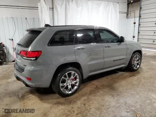 2021 Jeep Grand Cherokee SRT with VIN 1C4RJFDJ5MC667774, listed as a Copart auction lot 42484435 with 43,387 mi miles and Salvage Title. Bid and sale history available at carsss.com. Image 3.
