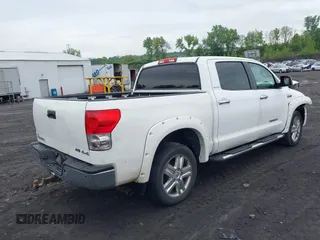 2009 Toyota Tundra Limited z VIN 5TFDW58169X086185, wystawiony jako IAAI lot #42240945 z przebiegiem 139 775 mil mil oraz . Historia ofert i sprzedaży dostępna na DreamBid. Obrazek 4.