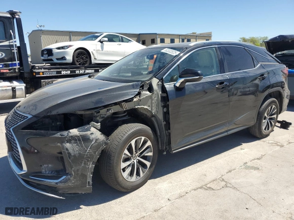 2020 Lexus RX with VIN 2T2HZMDA5LC231176, listed as a Copart auction lot 50333525 with 61,756 mi miles and Salvage Title. Bid and sale history available at carsss.com. Image 1.