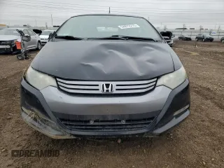 2010 Honda Insight LX with VIN JHMZE2H56AS022299, listed as a Copart auction lot 54872215 with 149,514 mi miles and Salvage title. Bid and sale history available at DreamBid. Image 5.