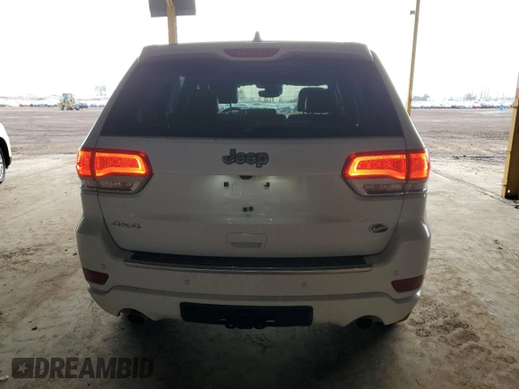 2017 Jeep Grand Cherokee Overland with VIN 1C4RJFCG2HC834328, listed as a Copart auction lot 45199855 with 87,061 mi miles and Salvage Title. Bid and sale history available at carsss.com. Image 6.
