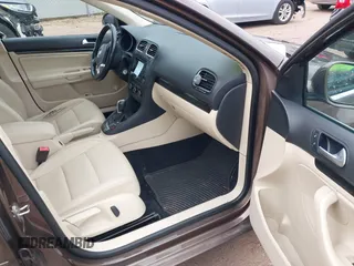 2012 Volkswagen Jetta SportWagen TDI w/Sunroof with VIN 3VWPL7AJ6CM647247, listed as a IAAI auction lot 42042449 with 186,015 mi miles. Bid and sale history available at carsss.com. Image 5.