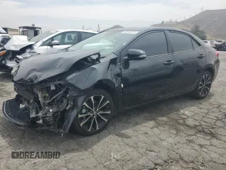 2019 Toyota Corolla L z VIN 5YFBURHE8KP932148, wystawiony jako Copart lot #58440225 z przebiegiem 88 968 mil mil oraz Szkoda całkowita • Salvage title. Historia ofert i sprzedaży dostępna na DreamBid. Obrazek 1.