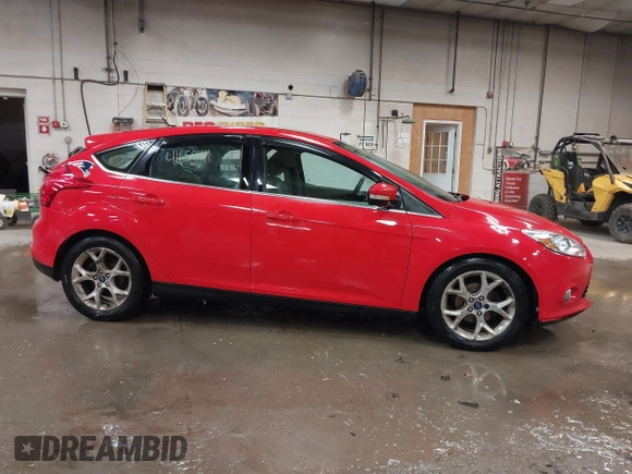 2012 Ford Focus SEL with VIN 1FAHP3M23CL460290, listed as a IAAI auction lot 41655711 with 137,743 mi miles. Bid and sale history available at carsss.com. Image 13.
