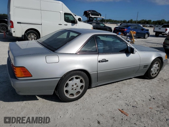1991 MERCEDES-BENZ SL-CLASS SL with VIN WDBFA61E1MF022918, listed as a Copart auction lot 85011784 with 262,144 mi miles and Salvage Title. Bid and sale history available at DreamBid. Image 3.