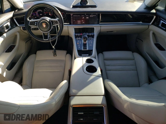 2018 Porsche Panamera с VIN WP0AA2A72JL104157, выставлен на аукционе Copart как лот 82147974 с пробегом 98 933 миль миль и Списание • Salvage title. История ставок и продаж доступна на DreamBid. Изображение 8.