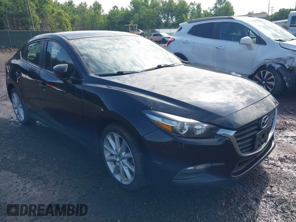 2017 Mazda 3 Touring z VIN 3MZBN1V74HM128575, wystawiony jako IAAI lot #42731487 z przebiegiem 136 553 mil mil oraz . Historia ofert i sprzedaży dostępna na DreamBid. Obrazek 1.