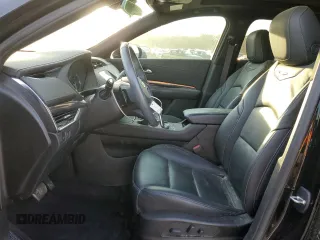 2023 Cadillac XT4 FWD Luxury with VIN 1GYAZAR49PF102307, listed as a Copart auction lot 49342465 with 21,093 mi miles and Salvage Title. Bid and sale history available at DreamBid. Image 7.