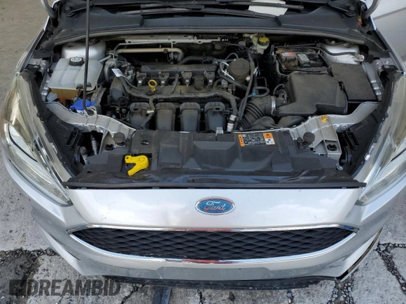 2016 Ford Focus SE z VIN 1FADP3F29GL268308, wystawiony jako Copart lot #56738415 z przebiegiem 111 702 mil mil oraz Szkoda całkowita • Salvage title. Historia ofert i sprzedaży dostępna na DreamBid. Obrazek 11.