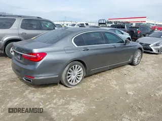 2017 BMW 7 Series 740i with VIN WBA7E2C54HG740170, listed as a IAAI auction lot 41432578 with 110,893 mi miles and . Bid and sale history available at DreamBid. Image 4.