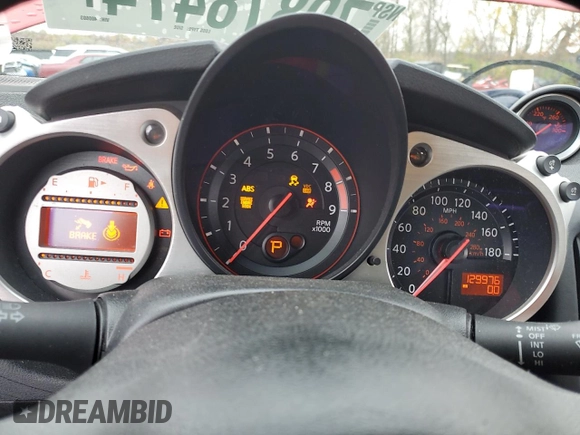 2009 Nissan 370Z z VIN JN1AZ44E19M400603, wystawiony jako Copart lot #79878474 z przebiegiem 129 976 mil mil oraz Szkoda całkowita • Salvage title. Historia ofert i sprzedaży dostępna na DreamBid. Obrazek 9.