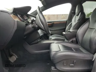 2018 Tesla Model X 75D with VIN 5YJXCBE24JF130216, listed as a Copart auction lot 48894215 with 75,694 mi miles and Salvage Title. Bid and sale history available at carsss.com. Image 7.