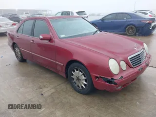2000 Mercedes-Benz E-Class with VIN WDBJF65J1YB113770, listed as a IAAI auction lot 41462464 with 157,279 mi miles. Bid and sale history available at carsss.com. Image 1.