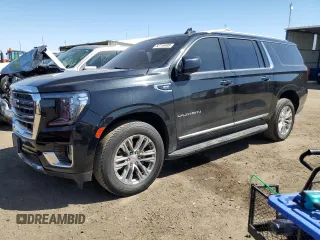2021 GMC Yukon XL SLT with VIN 1GKS2GKD5MR370474, listed as a Copart auction lot 52116495 with 76,489 mi miles and Salvage title. Bid and sale history available at DreamBid. Image 1.