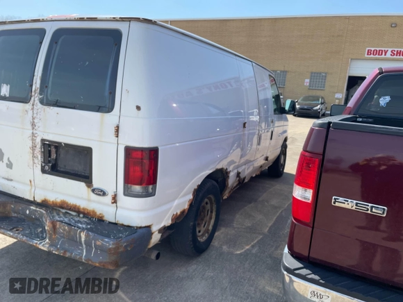 2006 Ford Econoline Cargo with VIN 1FTRE14W76HB24872, listed as a IAAI auction lot 42081212 with Not Provided miles and . Bid and sale history available at carsss.com. Image 4.