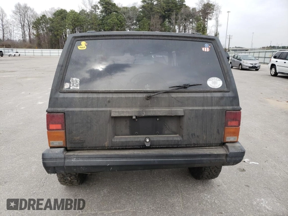 1994 Jeep Cherokee Sport with VIN 1J4FT68S0RL177339, listed as a Copart auction lot 47237805 with 207,156 mi miles and Salvage Title. Bid and sale history available at carsss.com. Image 6.