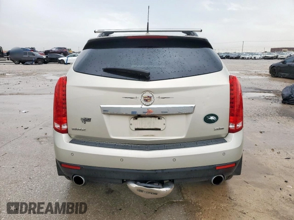 2013 Cadillac SRX Luxury Collection z VIN 3GYFNCE31DS568086, wystawiony jako Copart lot #55923155 z przebiegiem 147 148 mil mil oraz Szkoda całkowita • Salvage title. Historia ofert i sprzedaży dostępna na DreamBid. Obrazek 6.