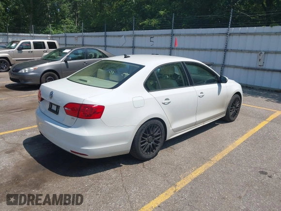2014 Volkswagen Jetta SE with VIN 3VWD07AJ8EM296243, listed as a IAAI auction lot 42754554 with 149,717 mi miles and . Bid and sale history available at DreamBid. Image 4.