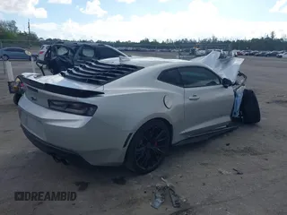 2018 Chevrolet Camaro 2SS z VIN 1G1FH1R72J0159136, wystawiony jako IAAI lot #41540051 z przebiegiem Nie podano mil oraz . Historia ofert i sprzedaży dostępna na DreamBid. Obrazek 4.