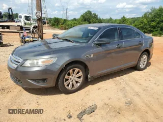 2012 Ford Taurus SE z VIN 1FAHP2DW6CG139897, wystawiony jako Copart lot #60359595 z przebiegiem 248 724 mil mil oraz Czysty tytuł • Clean title. Historia ofert i sprzedaży dostępna na DreamBid. Obrazek 1.