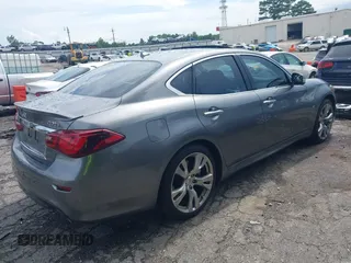2015 Infiniti Q70 with VIN JN1BY1AP6FM540296, listed as a IAAI auction lot 42524538 with 119,933 mi miles and . Bid and sale history available at DreamBid. Image 4.