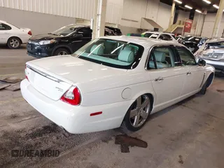2008 Jaguar XJ Vanden Plas with VIN SAJWA82B28SH29030, listed as a IAAI auction lot 41231242 with 62,632 mi miles. Bid and sale history available at carsss.com. Image 4.