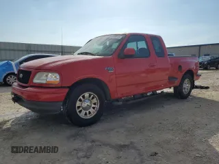 2002 Ford F-150 XL with VIN 2FTRX07WX2CA98348, listed as a Copart auction lot 43705135 with 204,718 mi miles and Salvage title. Bid and sale history available at DreamBid. Image 1.