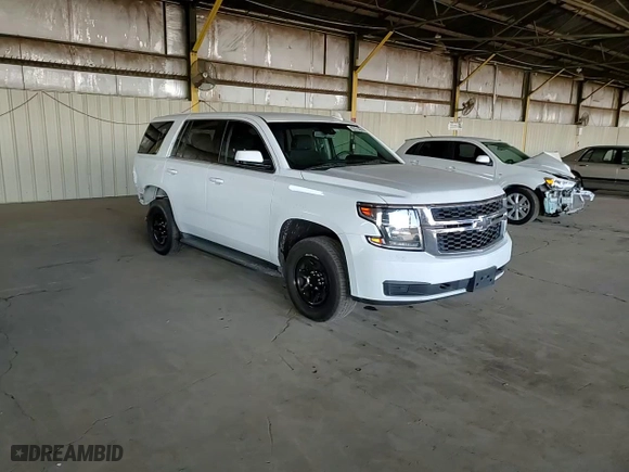 2016 Chevrolet Tahoe Commercial with VIN 1GNLCDEC9GR145324, listed as a Copart auction lot 83371894 with 106,390 mi miles and Salvage Title. Bid and sale history available at carsss.com. Image 11.