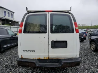 2013 Chevrolet Express Cargo z VIN 1GCWGFFA7D1103926, wystawiony jako Copart lot #55557045 z przebiegiem 284 824 mil mil oraz Tytuł czysty. Historia ofert i sprzedaży dostępna na DreamBid. Obrazek 6.