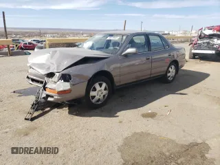 1994 Toyota Camry LE z VIN JT2GK12E2R0050878, wystawiony jako Copart lot #46878005 z przebiegiem 152 211 mil mil oraz Szkoda całkowita • Salvage title. Historia ofert i sprzedaży dostępna na DreamBid. Obrazek 1.