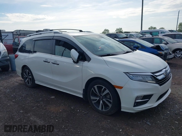 2018 Honda Odyssey Elite with VIN 5FNRL6H98JB045078, listed as a IAAI auction lot 42184758 with 144,981 mi miles. Bid and sale history available at carsss.com. Image 1.