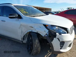 2020 Kia Sorento LX V6 with VIN 5XYPG4A59LG661617, listed as a IAAI auction lot 41279414 with 148,845 mi miles. Bid and sale history available at carsss.com. Image 6.