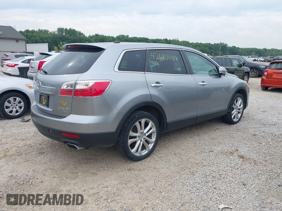 2012 Mazda CX-9 Grand Touring z VIN JM3TB3DV0C0367314, wystawiony jako IAAI lot #42680001 z przebiegiem 239 975 mil mil oraz . Historia ofert i sprzedaży dostępna na DreamBid. Obrazek 4.