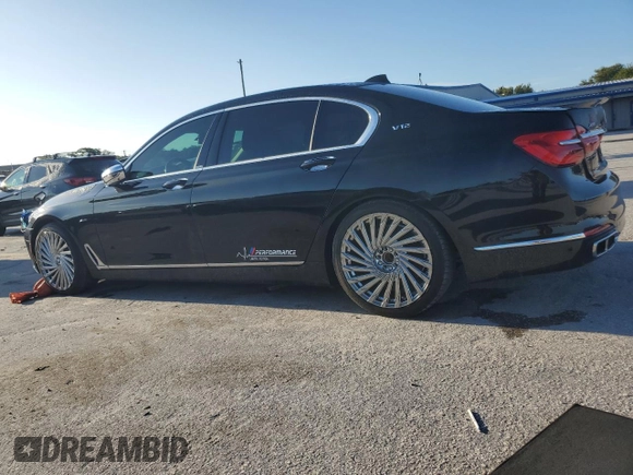 2017 BMW 7 Series 740i xDrive with VIN WBA7E4C34HGU99964, listed as a Copart auction lot 69808464 with 93,423 mi miles and Non Repairable. Bid and sale history available at carsss.com. Image 2.