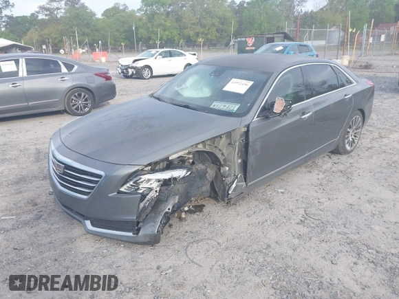 2016 Cadillac CT6 Luxury AWD with VIN 1G6KD5RSXGU157247, listed as a IAAI auction lot 41972456 with 81,866 mi miles and . Bid and sale history available at DreamBid. Image 2.