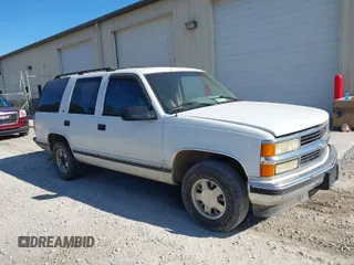 1996 Chevrolet Tahoe Limited z VIN 1GNEC13R0TJ309292, wystawiony jako IAAI lot #41412643 z przebiegiem 219 815 mil mil oraz . Historia ofert i sprzedaży dostępna na DreamBid. Obrazek 1.