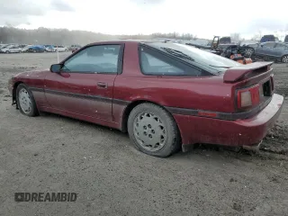 1987 Toyota Supra z VIN JT2MA71J4H0068594, wystawiony jako Copart lot #81918653 z przebiegiem 91 630 mil mil oraz Szkoda całkowita • Salvage title. Historia ofert i sprzedaży dostępna na DreamBid. Obrazek 2.