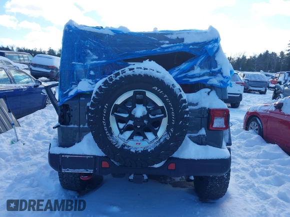 2020 Jeep Wrangler Unlimited Rubicon z VIN 1C4HJXFN5LW176104, wystawiony jako IAAI lot #41332511 z przebiegiem 70 428 mil mil oraz . Historia ofert i sprzedaży dostępna na DreamBid. Obrazek 17.
