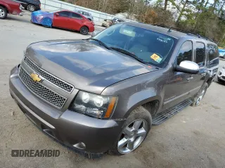 2014 Chevrolet Suburban LTZ with VIN 1GNSCKE03ER151784, listed as a Copart auction lot 43482165 with 247,413 mi miles and Salvage title. Bid and sale history available at DreamBid. Image 1.