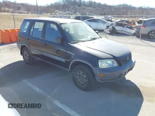 1999 Honda CR-V LX with VIN JHLRD184XXC046133, listed as a IAAI auction lot 41696784 with 236,532 mi miles. Bid and sale history available at carsss.com. Image 1.